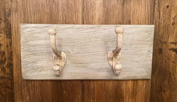 Two Cast Iron Wall Hooks on Reclaimed Barn Wood